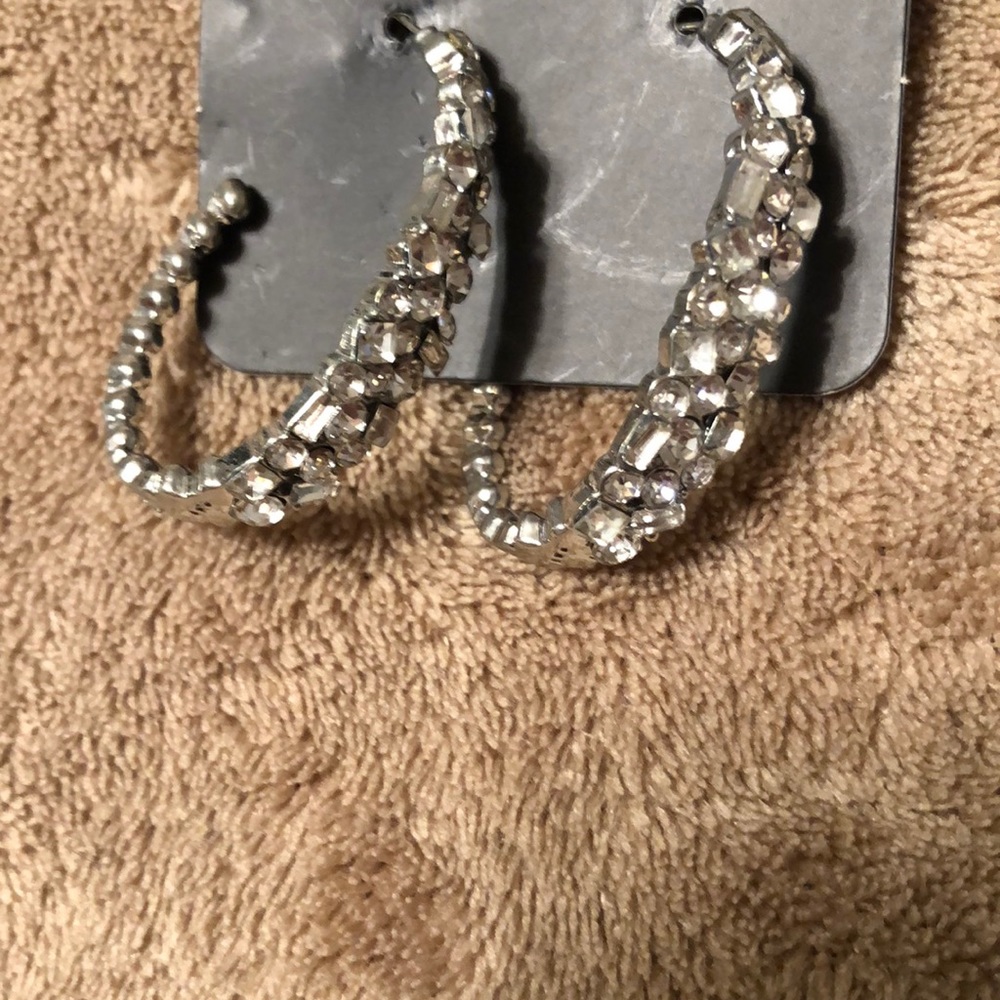 Glitzy white hoop earrings